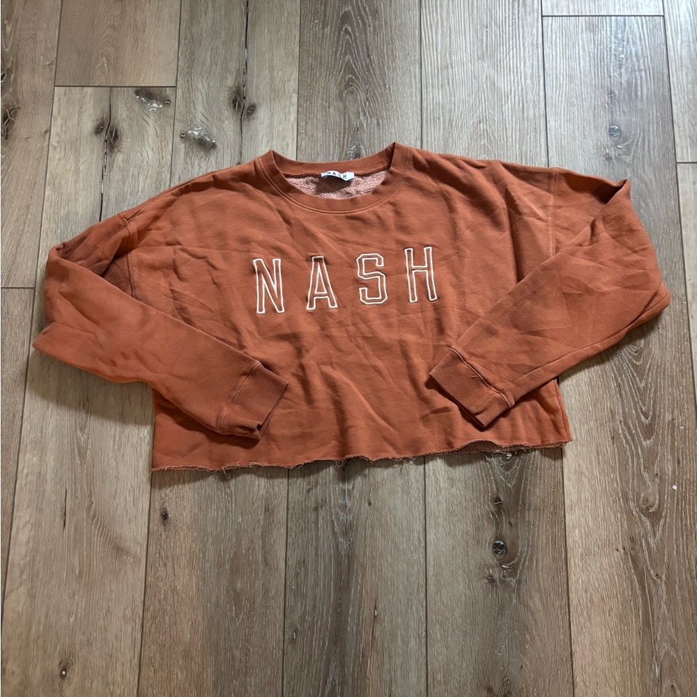 The Nash Collection Nashville Women's Distressed Crewneck In Burnt Orange